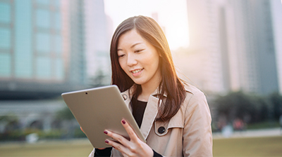 A woman using a tablet 