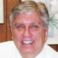 Headshot of a businessman smiling