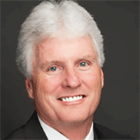 Headshot of a businessman smiling