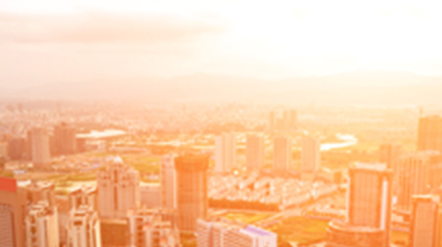 Elevated view of a city with orange tint