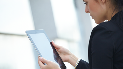 Businesswoman working on a tablet