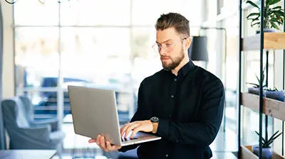 A man working on a laptop